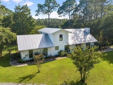 Nestled on a private one-acre homesite overlooking the tranquil - photo 41