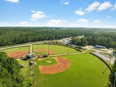 Nestled on a private one-acre homesite overlooking the tranquil - photo 48