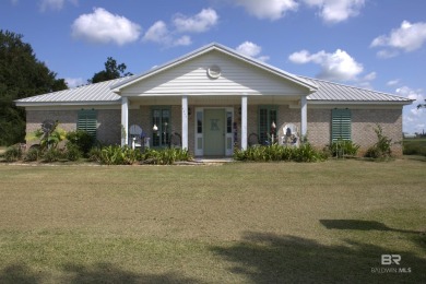 Nestled on the outskirts of Fairhope, this appealing