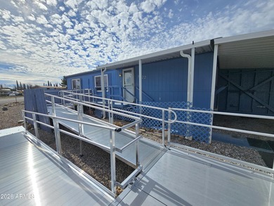 This 3-bedroom, 2-bath home sits on a spacious, fully fenced