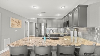 Experience luxury lake living at its finest in this - photo 15