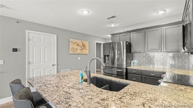 Experience luxury lake living at its finest in this - photo 16