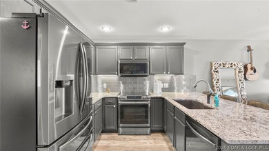 Experience luxury lake living at its finest in this - photo 17