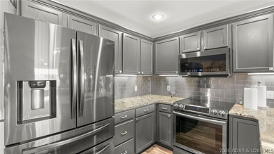 Experience luxury lake living at its finest in this - photo 18