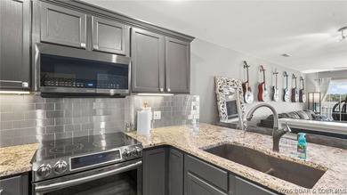 Experience luxury lake living at its finest in this - photo 20