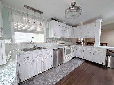 Experience elevated, low-maintenance living in this beautifully - photo 8
