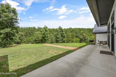 Set on 5.59 acres, this new custom ranch offers a beautiful - photo 45