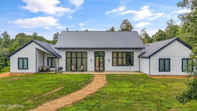Set on 5.59 acres, this new custom ranch offers a beautiful - photo 47