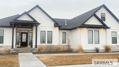This home features 10-foot ceilings and a large three-car garage - photo 1