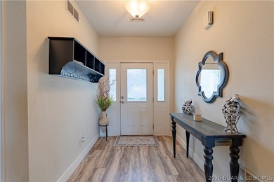 Welcome to easy lake living without the waterfront price tag, in - photo 2