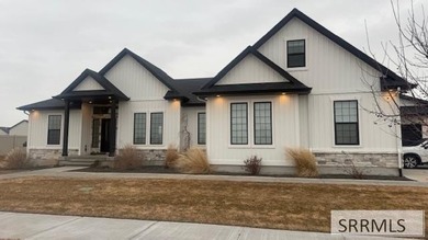 This home features 10-foot ceilings and a large three-car garage - photo 2