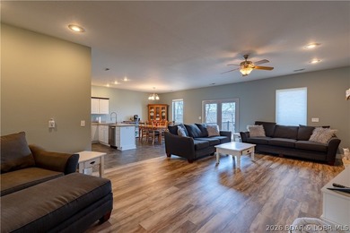Welcome to easy lake living without the waterfront price tag, in - photo 3