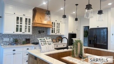 This home features 10-foot ceilings and a large three-car garage - photo 4