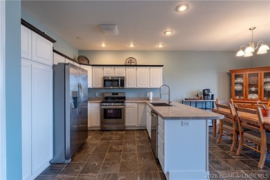 Welcome to easy lake living without the waterfront price tag, in - photo 7