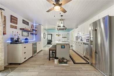 Perfectly located in the heart of Osage Beach, this beautifully - photo 11