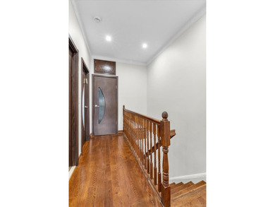 Step into this stunning fully renovated attached brick one - photo 11