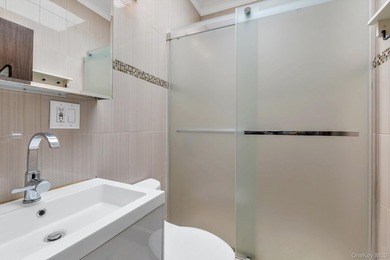 Step into this stunning fully renovated attached brick one - photo 20