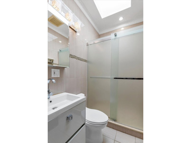 Step into this stunning fully renovated attached brick one - photo 21