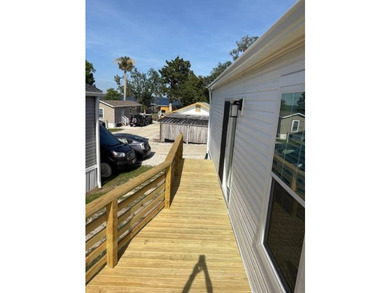 OPPORTUNITY TO OWN A NEW HOME! Escape to sunny relaxation with - photo 9