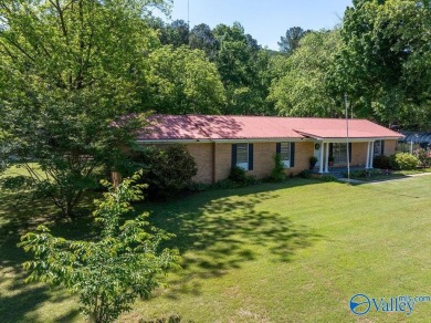 Lake Home For Sale in Owens Cross Roads, Alabama