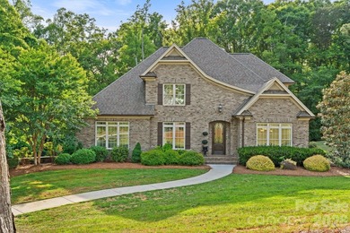 Tucked away on 2.5 private acres in desirable Stoney Point, this - photo 1