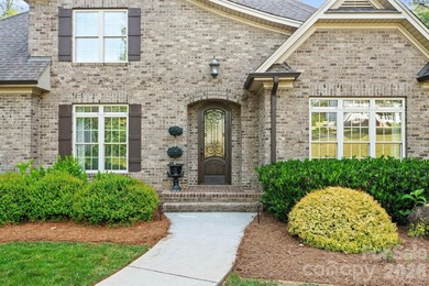 Tucked away on 2.5 private acres in desirable Stoney Point, this - photo 2