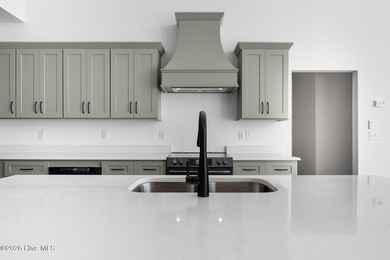 Welcome to an extraordinary new construction waterfront home - photo 9