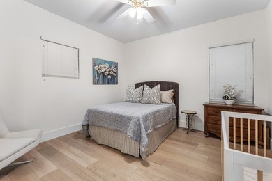 Situated on nearly 2 acres in the gated golf and equestrian - photo 39