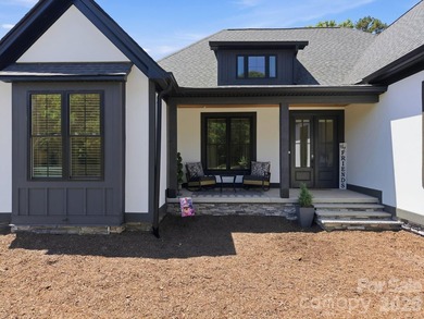 2023 build, sitting on 4.77 acres this 4BR, 3.5BA home blends - photo 4
