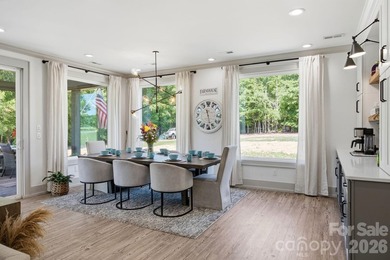 2023 build, sitting on 4.77 acres this 4BR, 3.5BA home blends - photo 10