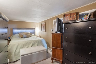 Welcome to your lake retreat! This darling cabin is in a quiet - photo 12