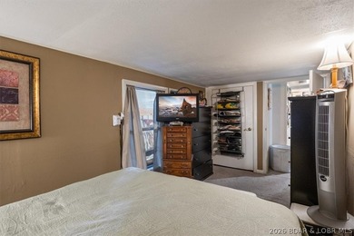 Welcome to your lake retreat! This darling cabin is in a quiet - photo 13