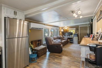 Welcome to your lake retreat! This darling cabin is in a quiet - photo 16