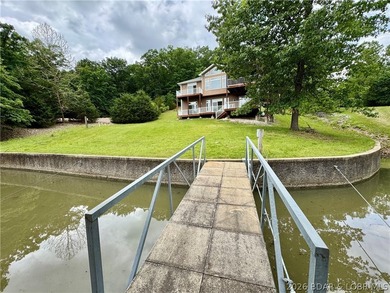 Lakefront living in a peaceful cove at the 26mm! Breathtaking - photo 3