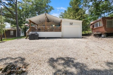 Welcome to your lake retreat! This darling cabin is in a quiet - photo 26