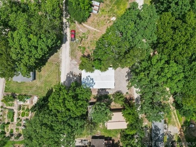 Welcome to your lake retreat! This darling cabin is in a quiet - photo 29