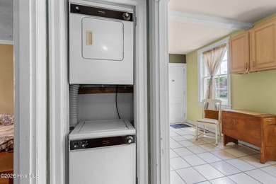 Nestled beneath a canopy of majestic live oaks, the historic - photo 8