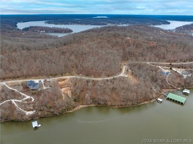 Nice Lake Front Building Lot in Eagle Bay Subdivisionmunity - photo 7