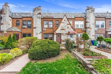 Updated one-family attached brick townhouse nestled in the heart - photo 1