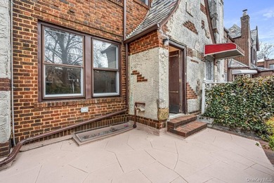 Updated one-family attached brick townhouse nestled in the heart - photo 2