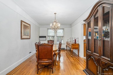Updated one-family attached brick townhouse nestled in the heart - photo 6