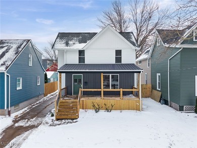 An opportunity to own a masterfully renovated century home, in - photo 2