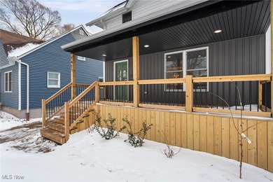 An opportunity to own a masterfully renovated century home, in - photo 4