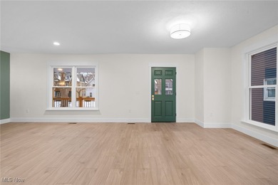 An opportunity to own a masterfully renovated century home, in - photo 5