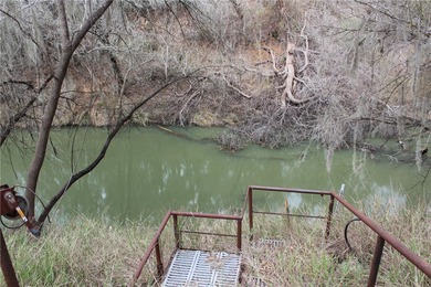 This 4.3 acre fenced property with Frio River frontage, a - photo 12