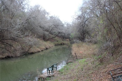 This 4.3 acre fenced property with Frio River frontage, a - photo 13