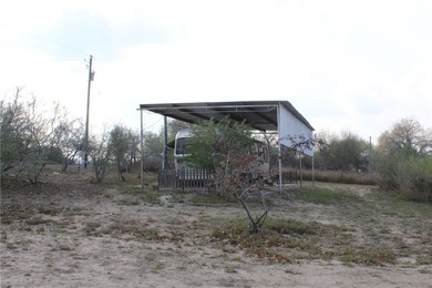 This 4.3 acre fenced property with Frio River frontage, a - photo 14