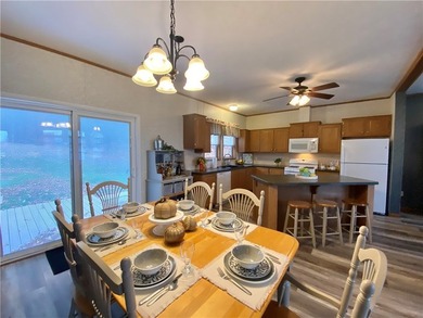 Nestled along the serene shores of Seneca Lake, this ranch - photo 17