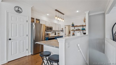 Check out this TWO story lakefront condo at the beautiful Shores - photo 8