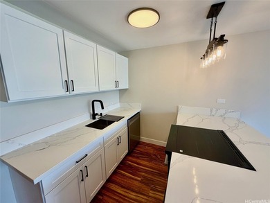 Discover this beautifully-remodeled high-floor unit in the - photo 18